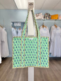 teal floral print quilted bag