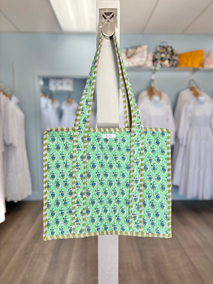 teal floral print quilted bag