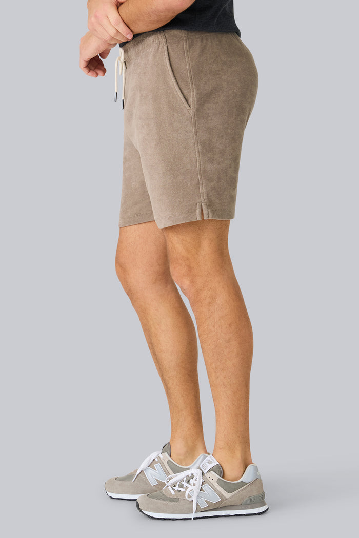 Side view of a man wearing Terry Cloth Short in Desert Taupe