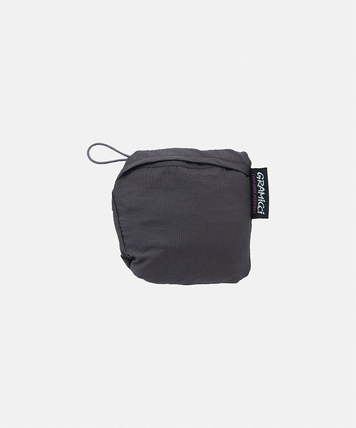 Midnight grey Gramicci reuseable Ultra-Light Shopper in pouch against a light-tone background.