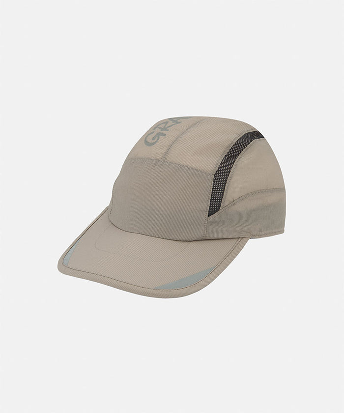 Gramicci Ultra-Light Tech Cap in concrete beige against a light-tone background.