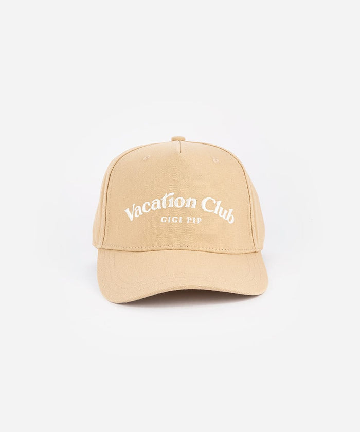 Beige cap with 'Vacation Club' text on a white background #color_tan