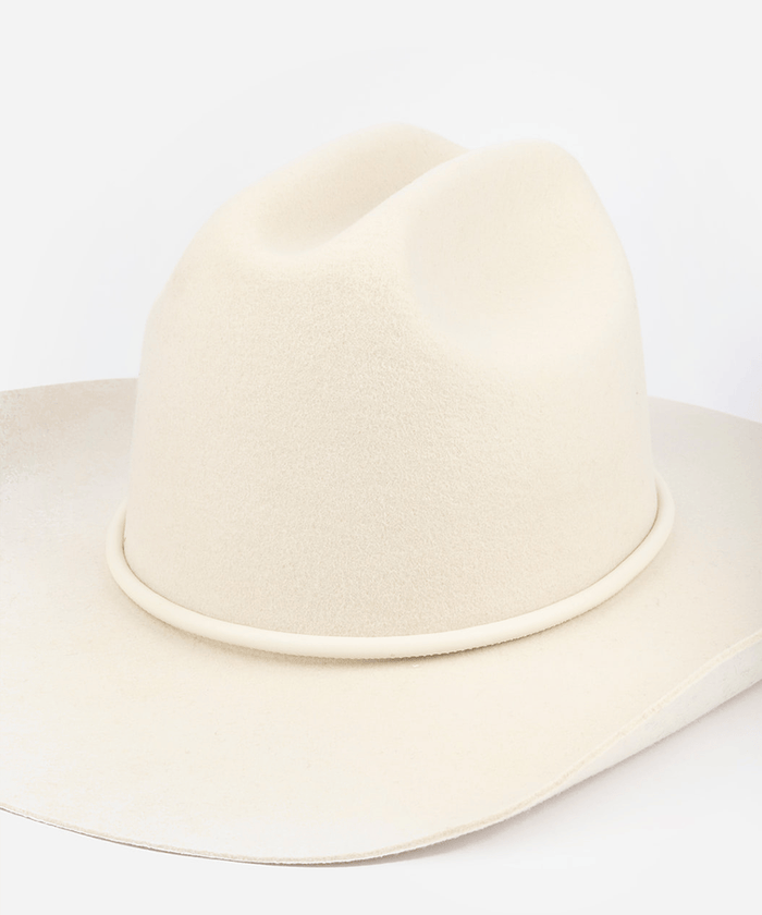 White wide-brimmed hat on a white background #color_off white