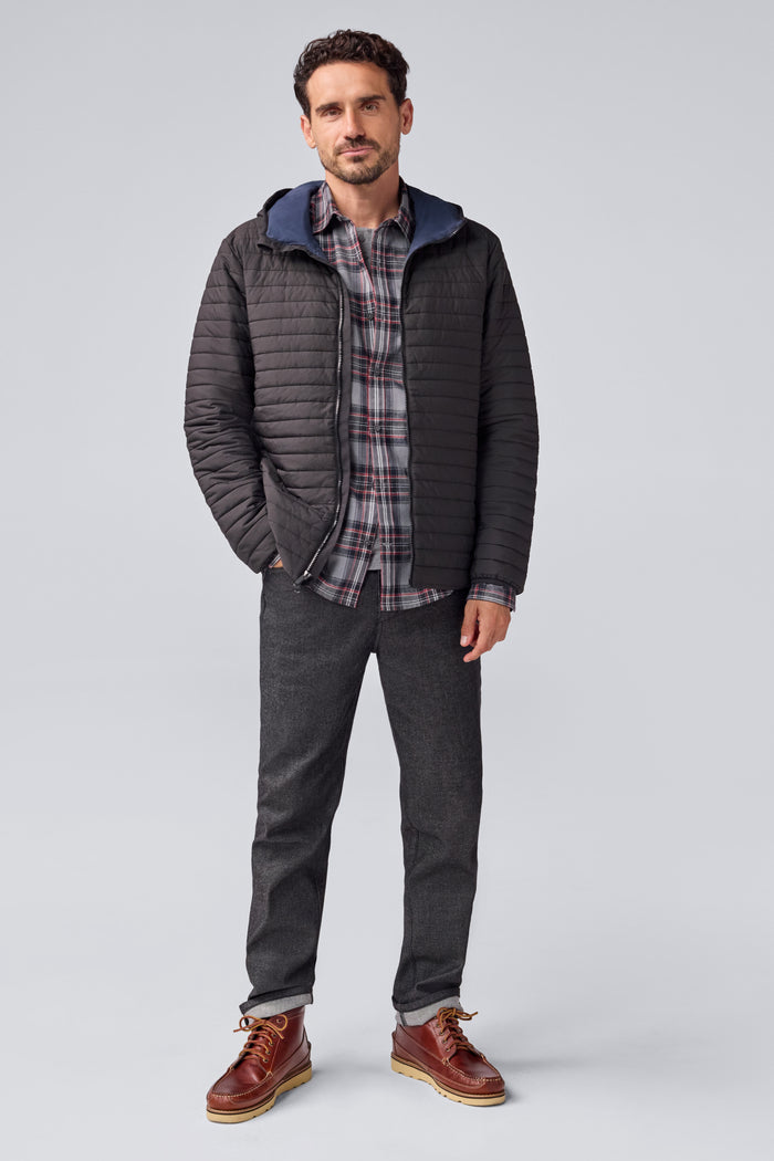 Full front view of a man wearing Warmknit Air Jacket in True Black/Total Eclipse Liner