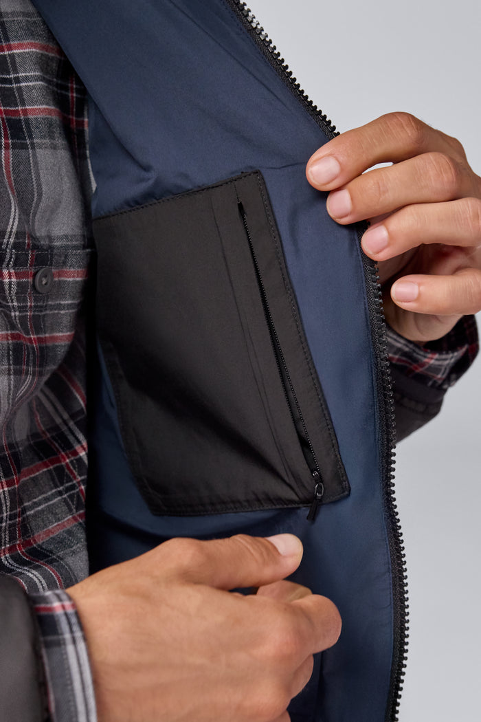 Inside pocket of Warmknit Air Jacket in True Black/Total Eclipse Liner