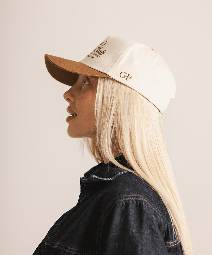Person wearing a beige and brown cap with 'GP' logo on a plain background
#color_cream - caramel