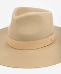 Beige wide-brimmed hat with a band on a white background #color_tan