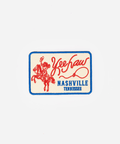 A rectangular embroidered patch featuring a cowboy riding a horse in red, with the words 'Yee Haw' in red script, 'NASHVILLE TENNESSEE' in blue block letters, and a blue border on a light cream background #color_off white - blue